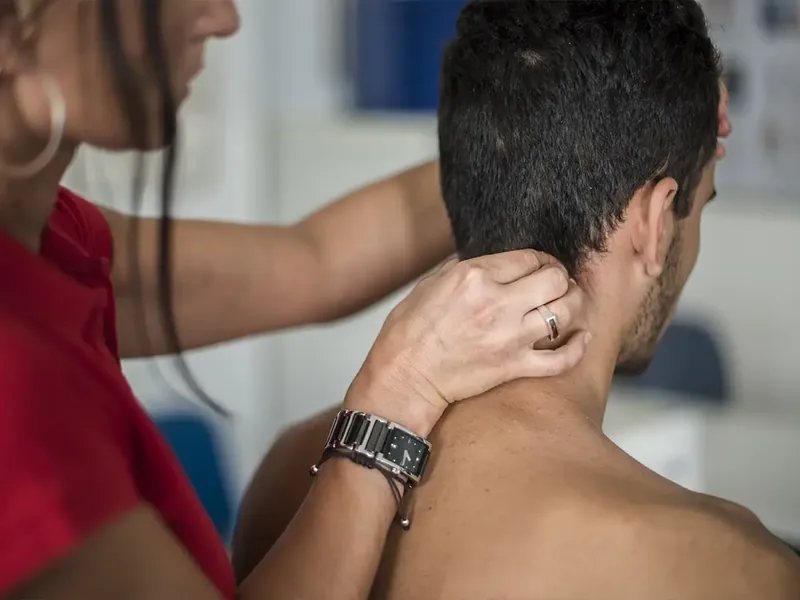 Neck assessment during a physical therapy evaluation