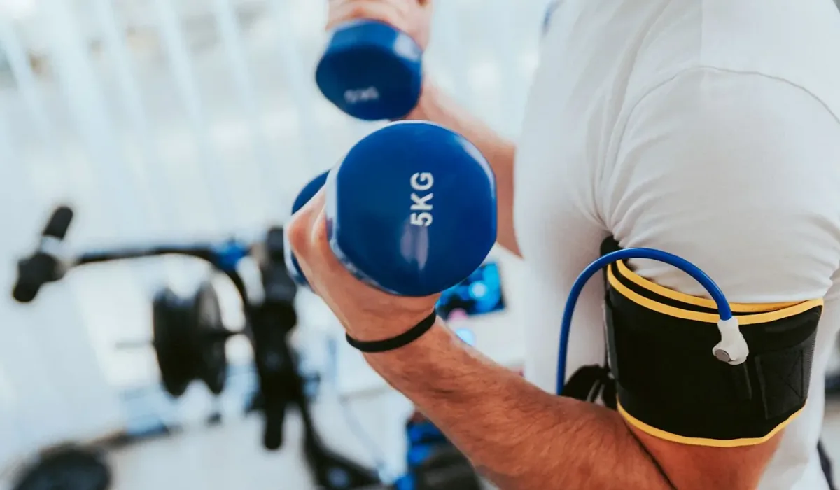 Patient training with a blood flow restriction cuff