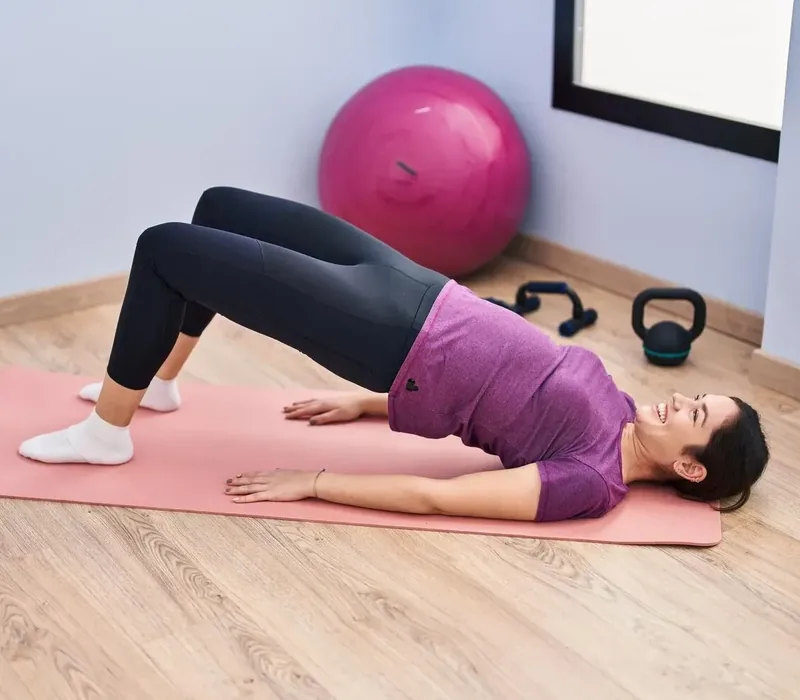 Pelvic health physical therapist consulting with a patient