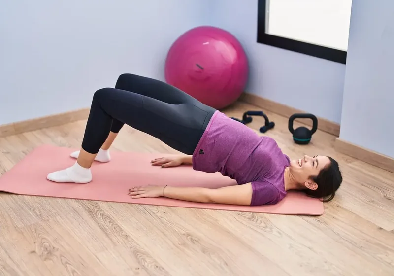 Pelvic health physical therapist consulting with a patient
